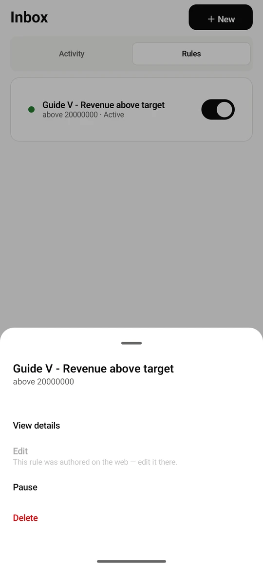 Tap a rule for its menu: View details, Edit, Pause and Delete. A rule written on the web is edited there; the app says so.